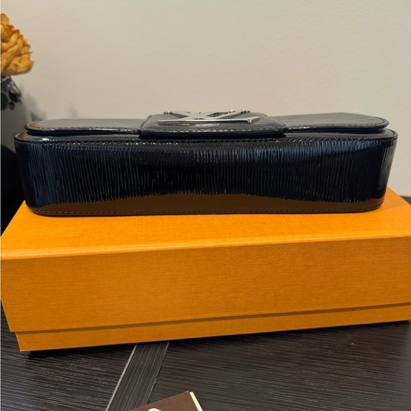 Louis Vuitton Epi Electric Pochette Sobie
Clutch Bag Noir - Picture 13 of 16